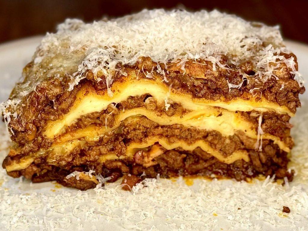 Homemade lasagna slice.