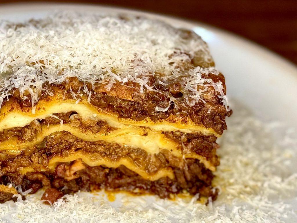 Homemade lasagna slice.